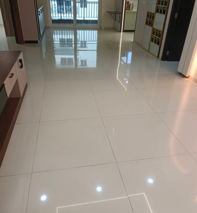 Hall floor polished to a mirror shine after a MyNeedUrban deep clean